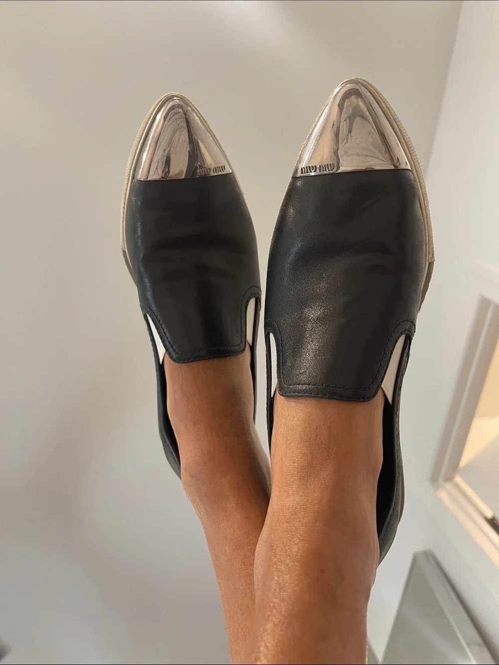 Miu Miu Black Leather Slip-Ons with Silver Cap Toe - Picture 4 of 9